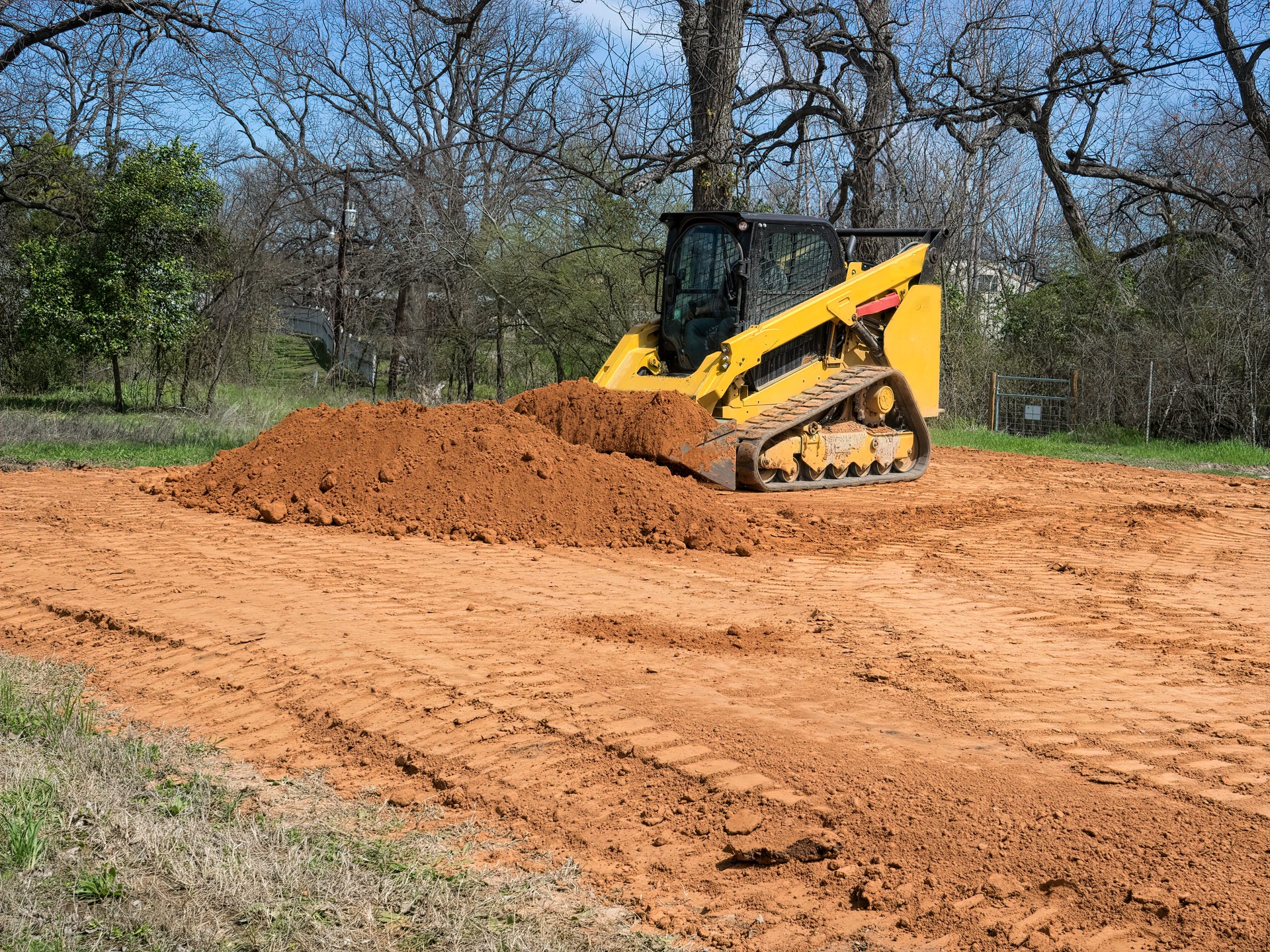 Skid Steer Loader - Getting Bucket Load of Dirt